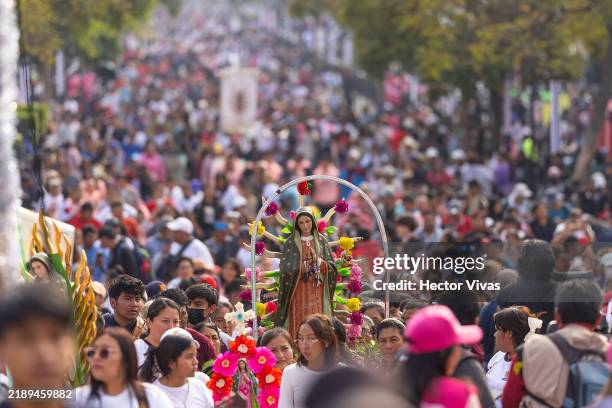 Pilgrims gather around the entrance to the Basilica of Guadalupe on December 11, 2024 in Mexico City, Mexico. Every December 12th, Mexicans celebrate...