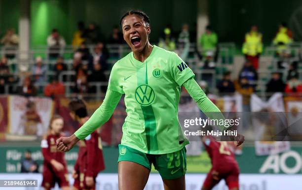 Sveindis Jonsdottir of VfL Wolfsburg celebrates scoring her team's fourth goal during the UEFA Women's Champions League match between VfL Wolfsburg...