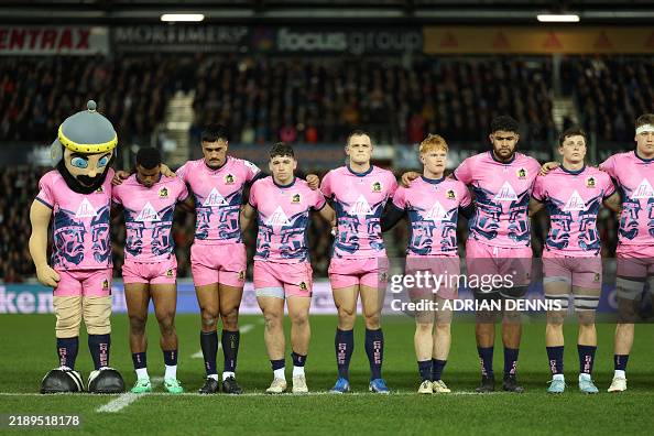 Rus Rugby Exeter Exeter players and mascot observe a minute's silence in honour of ...