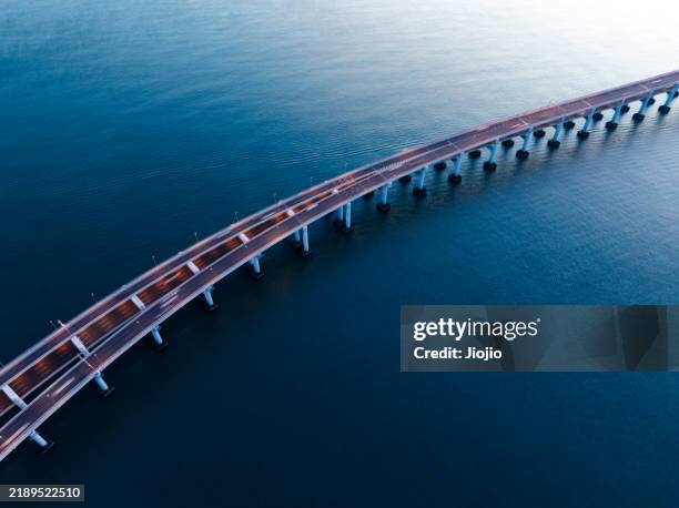 cross-sea bridge - bridge architecture up close night stock pictures, royalty-free photos & images