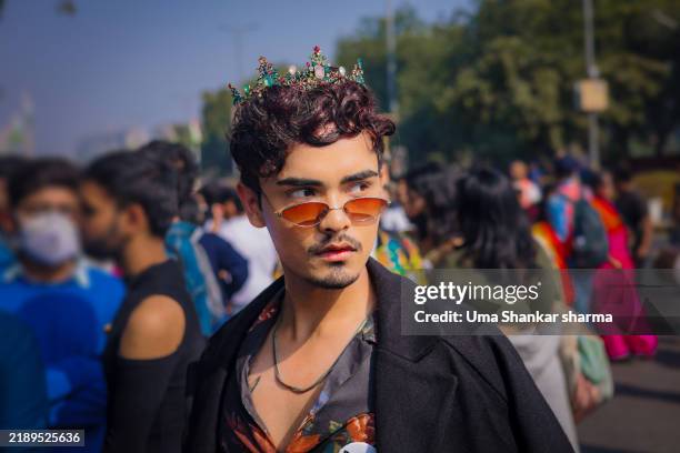 lgbtqia man outdoor portrait at a pride event. - gay pride parade stock pictures, royalty-free photos & images