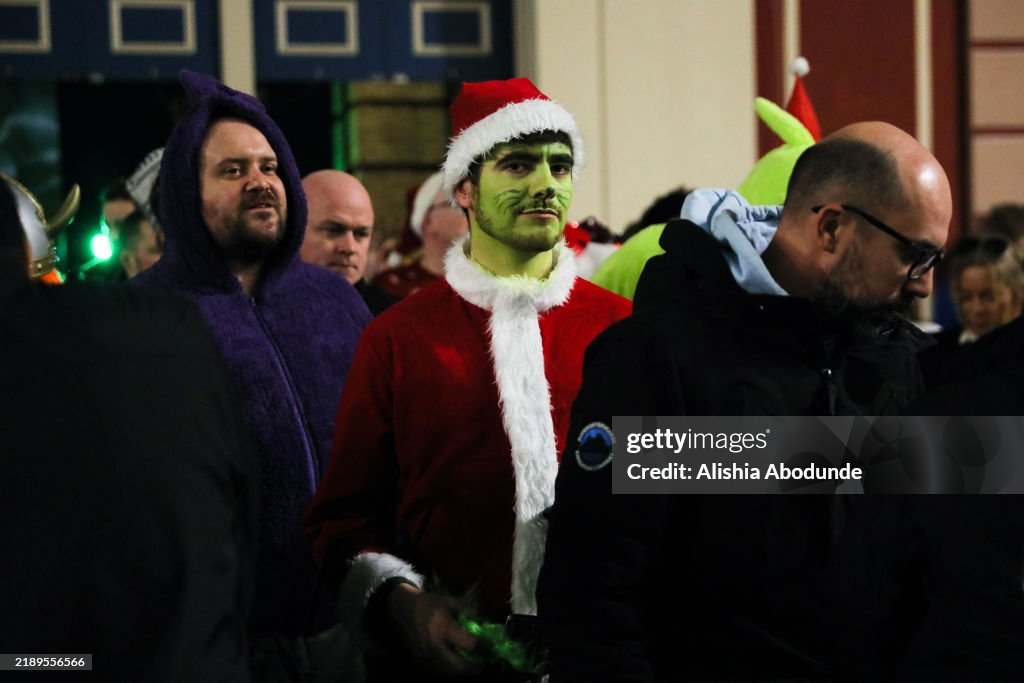 Darts fans arrive during day one of the 2025/2025 Paddy Power World