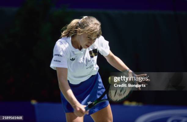 German tennis player Steffi Graf plays a backhand return during a Women's Singles match at the Australian Open at Flinders Park in Melbourne,...