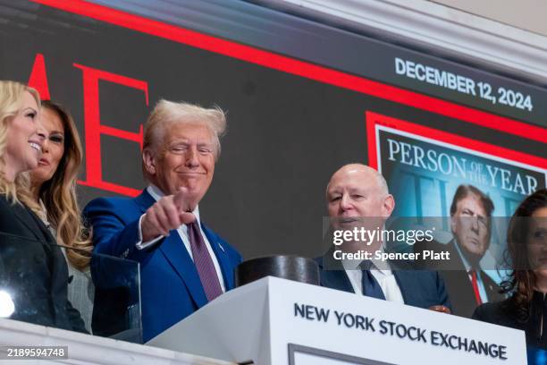 President-elect Donald Trump rings the opening bell on the trading floor of the New York Stock Exchange on December 12, 2024 in New York City. Trump...