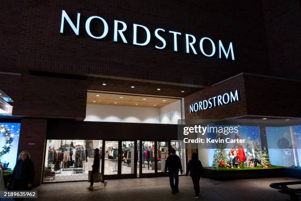 Shoppers walk into a Nordstrom department store at Fashion Valley, an upscale shopping mall on December 13, 2024 in San Diego, California.