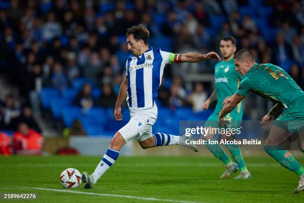 Mikel Oyarzabal of Real Sociedad scores after this action his team's third goal during the UEFA Europa League 2024/25 League Phase MD6 match between...