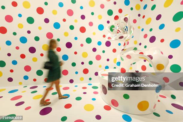 Visitors view the Yayoi Kusama exhibition at National Gallery of Victoria on December 13, 2024 in Melbourne, Australia.