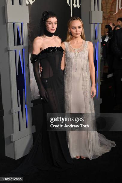 Emma Corrin and Lily-Rose Depp attend the Los Angeles premiere of Focus Features' "Nosferatu" at TCL Chinese Theater on December 12, 2024 in...