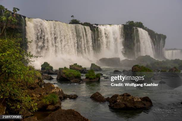 View from Brazilian side of the Iguassu Falls of the waterfalls on the Argentinian side, Iguassu National Park, Iguassu, Brazil.