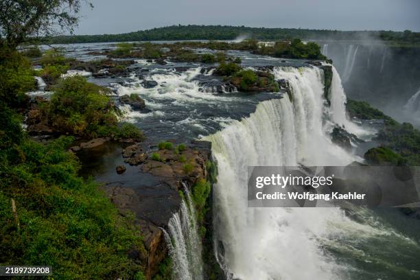 View from Brazilian side of the Iguassu Falls of the waterfalls on the Argentinian side, Iguassu National Park, Iguassu, Brazil.