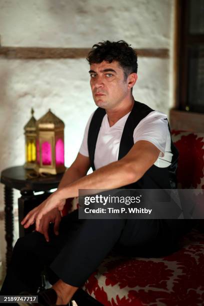 Riccardo Scamarcio poses during a photocall for "Modì, Three Days on the Wing of Madness" at the Red Sea International Film Festival 2024 on December...