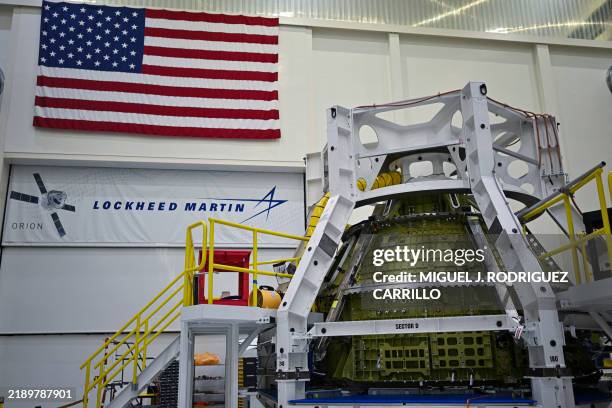 The Artemis IV Orion spacecraft is displayed in its Final Assembly Cell inside the Neil Armstrong Operations and Checkout Building at the Kennedy...