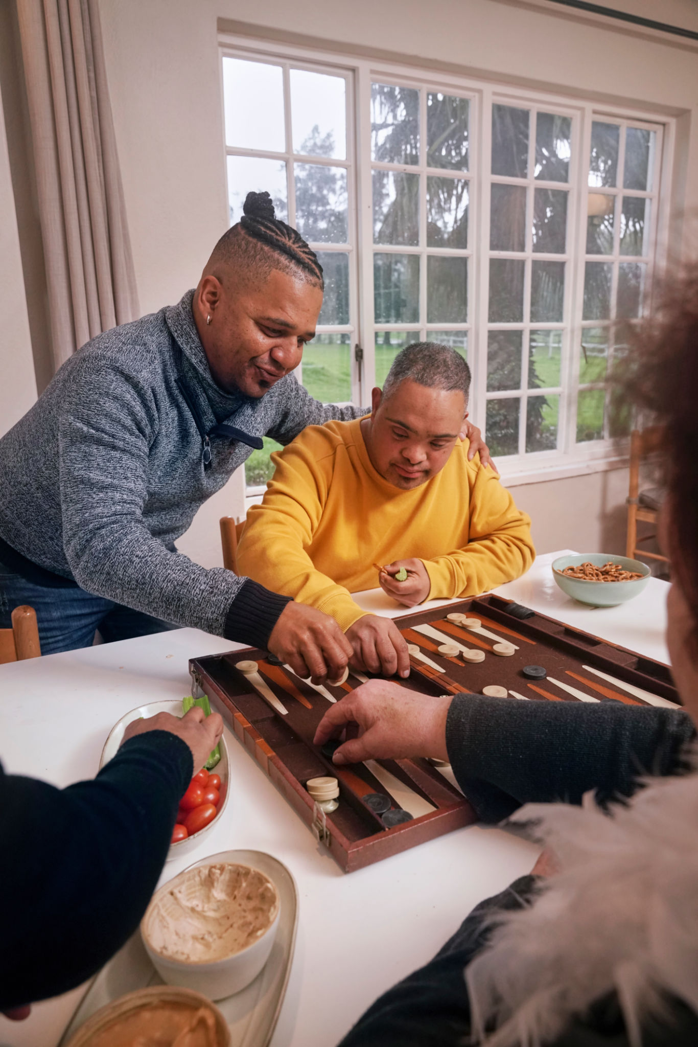 people playing backgammon