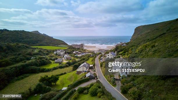 crackington haven bay in cornwall, england, uk. - moody sky stock pictures, royalty-free photos & images