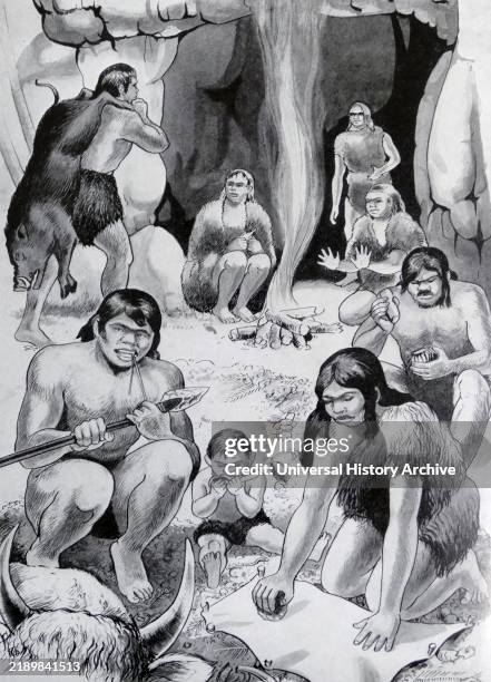 Illustration depicting a family of stone age hunters in a cave. The Stone Age was a broad prehistoric period during which stone was widely used to...