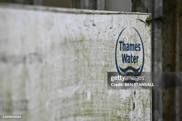 Photograph taken on December 17, 2024 shows a board sign with the logo of the company at the entrance of Thames Water's Willingale Sewage Treatment...