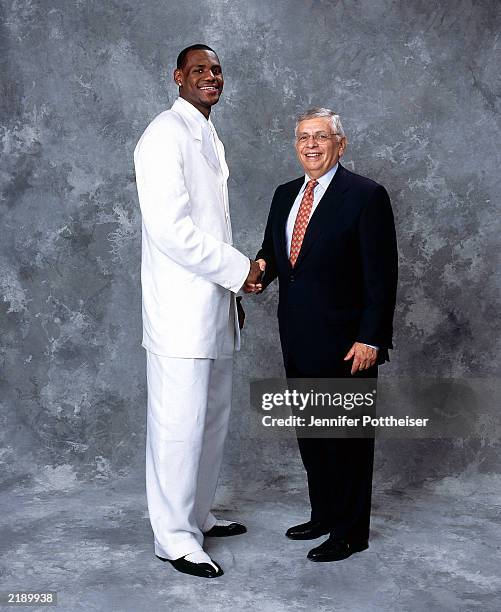 LeBron James poses for a portrait with Commissioner David Stern on draft night on June 26, 2003 at Madison Square Garden in New York, New York. NOTE...