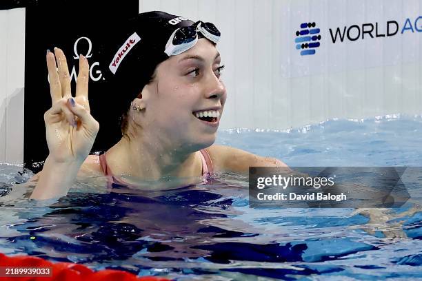 Gretchen Walsh of United States celebrates after winning in Women’s 100m Butterfly Final and beating the World Record during day five of the World...