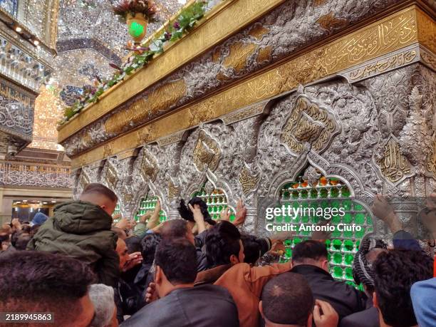 iraq-religion-islam-shiite. pilgrims at the shrine of al-husayn, karbala, iraq - sunni islam stock pictures, royalty-free photos & images