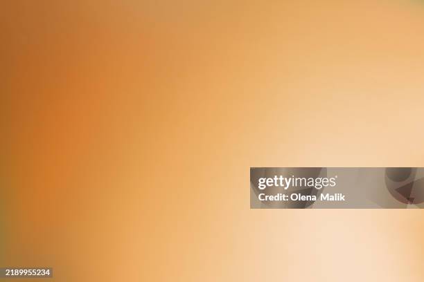 golden gradient abstract background with warm and soothing tones - warm light texture stock pictures, royalty-free photos & images