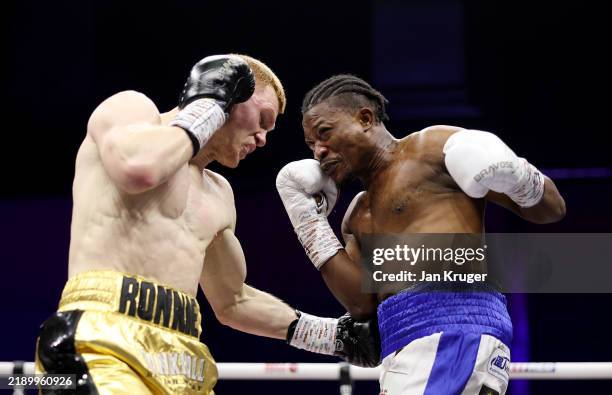 Boxing Colision Mark Jeffers punches Joshua Quartey during the Super Middleweight ...