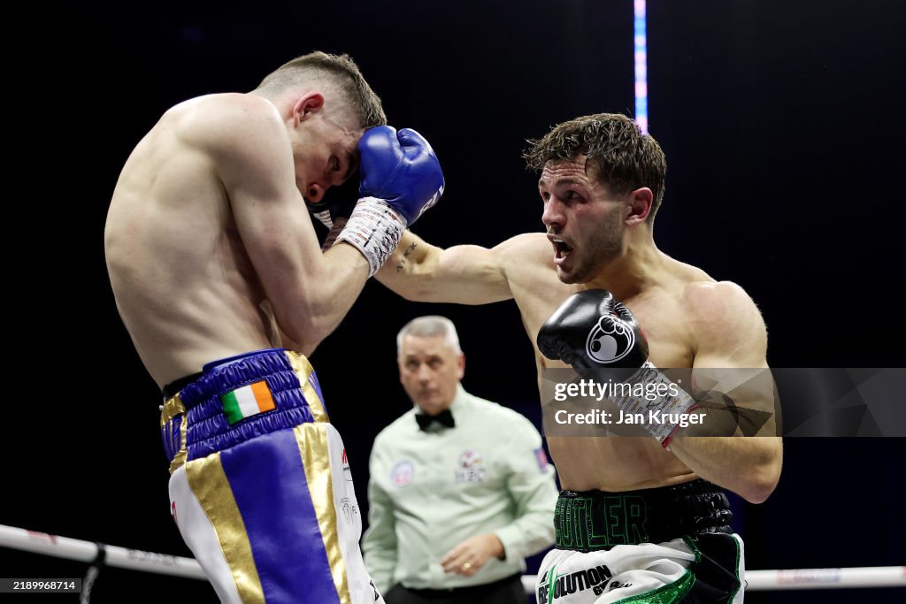 Boxing Colision Stephen McKenna is punched by Lee Cutler during the WBC International ...