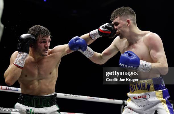 Boxing Colision Lee Cutler punches Stephen McKenna during the WBC International... News ...