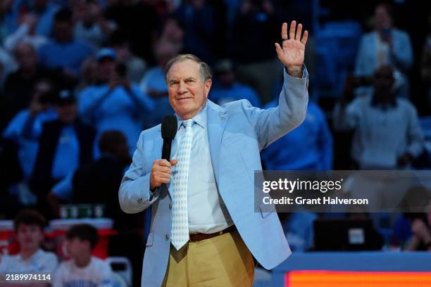 Head coach Bill Belichick of the North Carolina Tar Heels addresses the crowd during halftime in the game against the La Salle Explorers at the Dean...