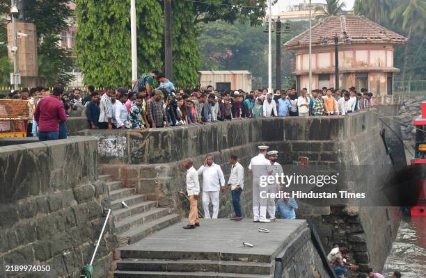 Navy personnel at Gateway of India after a ferry passenger boat capsized near Elephanta on December 18, 2024 in Mumbai, India. Thirteen people were...