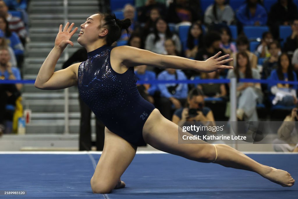 Emily Raber Ucla Emily Lee of the UCLA Bruins competes on floor exercise during UCLA ...