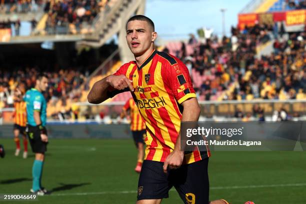 Nikola Krstovic of Lecce celebrates after scoring his team's second goal during the Serie A match between Lecce and Monza at Stadio Via del Mare on...
