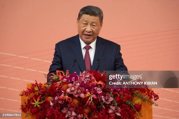 China's President Xi Jinping delivers his speech during a welcoming dinner ahead of celebrations for the 25th anniversary of Macau's handover from...