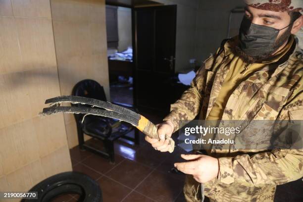 View of torture instruments at Arab Socialist Baath Party's National Security Bureau at Aleppo, Syria on December 18, 2024. The remains of food and...