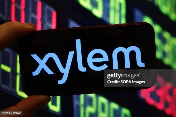 In this photo illustration, the Xylem company logo is seen displayed on a smartphone screen.