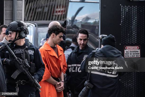 Luigi Mangione, suspect in the killing of UnitedHealthcare CEO Brian Thompson in New York City, arrives at a heliport with members of the NYPD on...