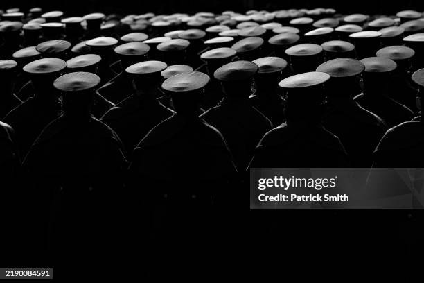 The Army Corp of Cadets march on the field before the 125th America's Game between the Army Black Knights and the Navy Midshipmen at Northwest...