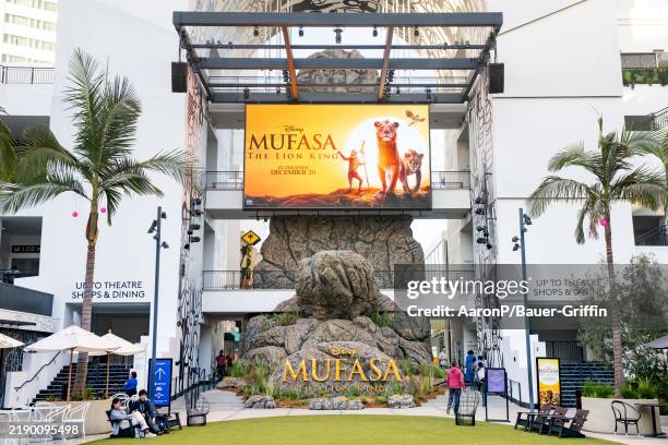 General view of the Ovation Hollywood courtyard promoting the new Disney film 'Mufasa: The Lion King' with a 'Pride Rock' photo op setup for tourists...