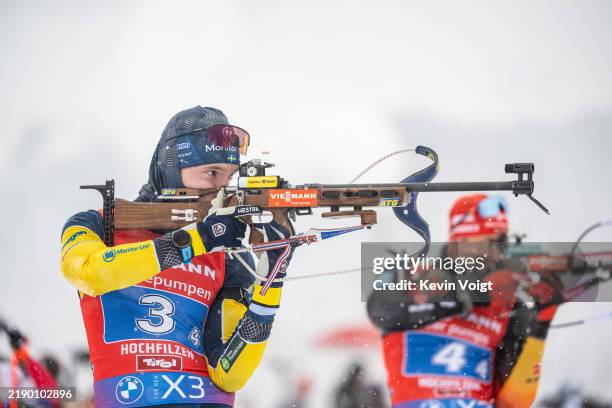 Sebastian Samuelsson of Sweden at the shooting range during the Men 4x7.5 km Relay at the BMW IBU World Cup Biathlon Hochfilzen on December 15, 2024...