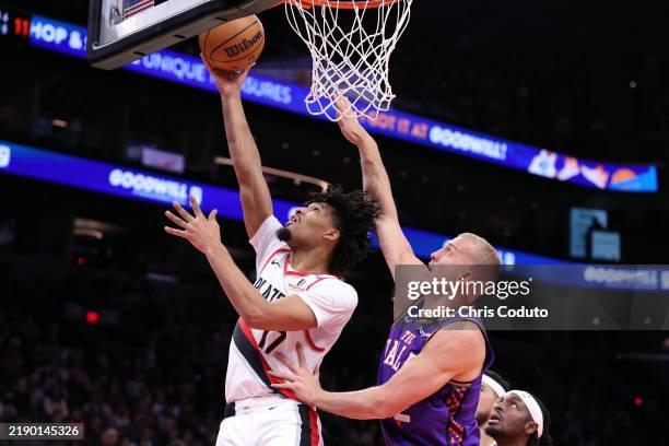Shaedon Sharpe of the Portland Trail Blazers attempts a layup against Mason Plumlee of the Phoenix Suns during the first half at Footprint Center on...
