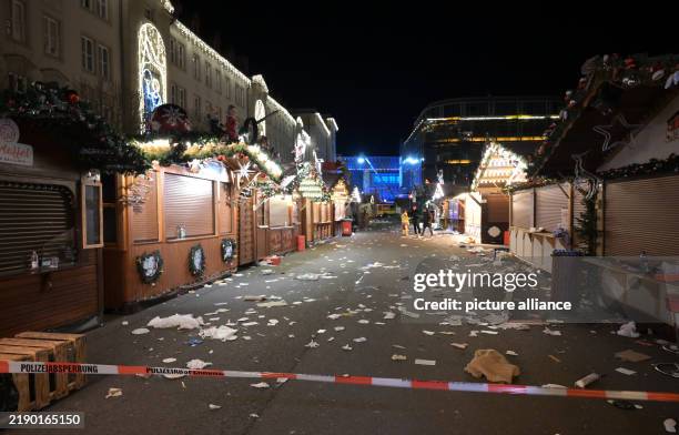 December 2024, Saxony-Anhalt, Magdeburg: A view of the cordoned-off Christmas market in Magdeburg. A driver drove into a group of people at the...