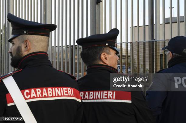 Carabinieri take security measures at the Bunker Courtroom of the Pagliarelli prison in Sicily, Italy on December 20, 2024. The court in Palermo...