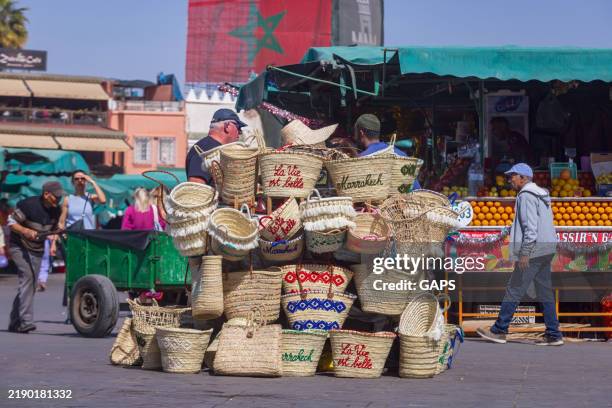lively street market on djeema el fna square in the moroccan city of marrakech - moroccan culture stock pictures, royalty-free photos & images