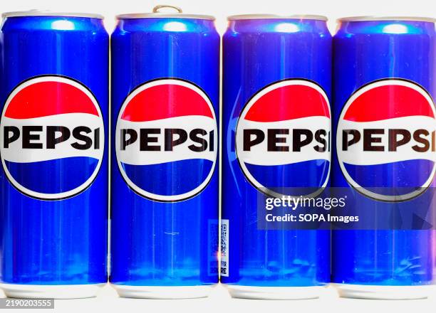In this photo illustration, Pepsi cans are displayed.