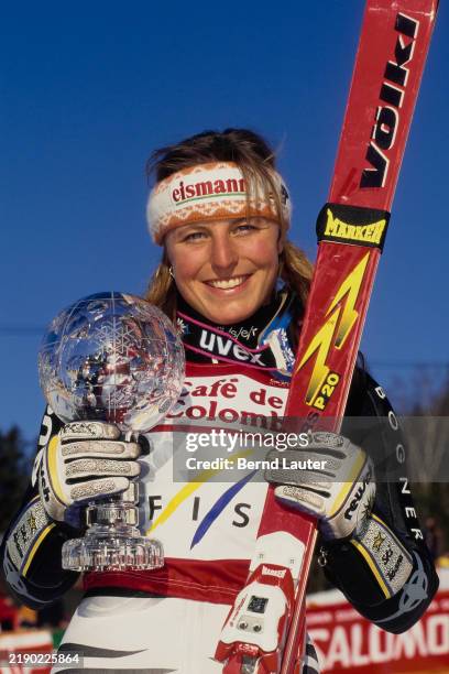 Portrait of Martina Ertl from Germany with the crystal glass trophy as winner of the Women's FIS Alpine Ski World Cup Giant Slalom cometition on 10th...