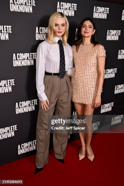 Elle Fanning and Monica Barbaro attends the photocall for "A Complete Unknown" at The Curzon Mayfair on December 16, 2024 in London, England.