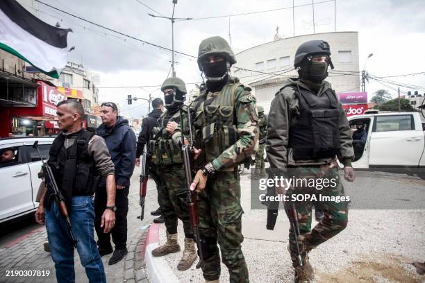 Palestinian security forces are seen during the clashes between Palestinian security forces and gunmen in the Jenin refugee camp west of the city of...