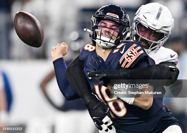 Jonathan Greenard of the Minnesota Vikings strip sacks Caleb Williams of the Chicago Bears during the first quarter at U.S. Bank Stadium on December...