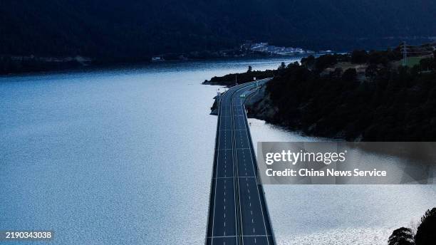 Aerial view of Dobutte bridge section of Lalin freeway, connecting Lhasa and Nyingchi, on December 16, 2024 in Nyingchi, Xizang Autonomous Region of...