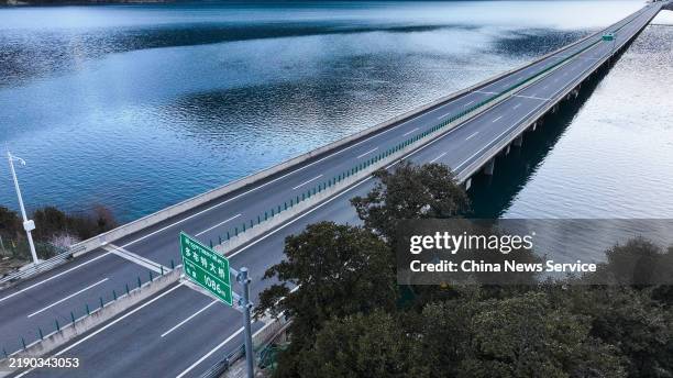Aerial view of Dobutte bridge section of Lalin freeway, connecting Lhasa and Nyingchi, on December 16, 2024 in Nyingchi, Xizang Autonomous Region of...