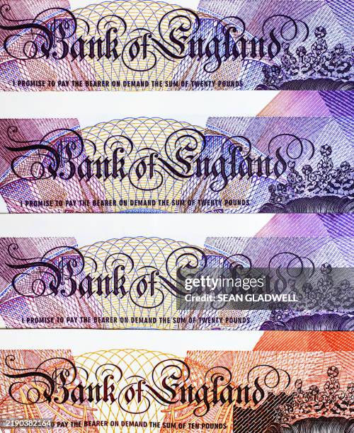 bank of england text on banknotes - british pound note stock pictures, royalty-free photos & images